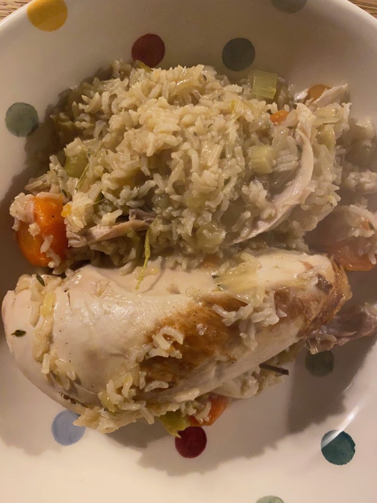 poule au riz on the plate close up