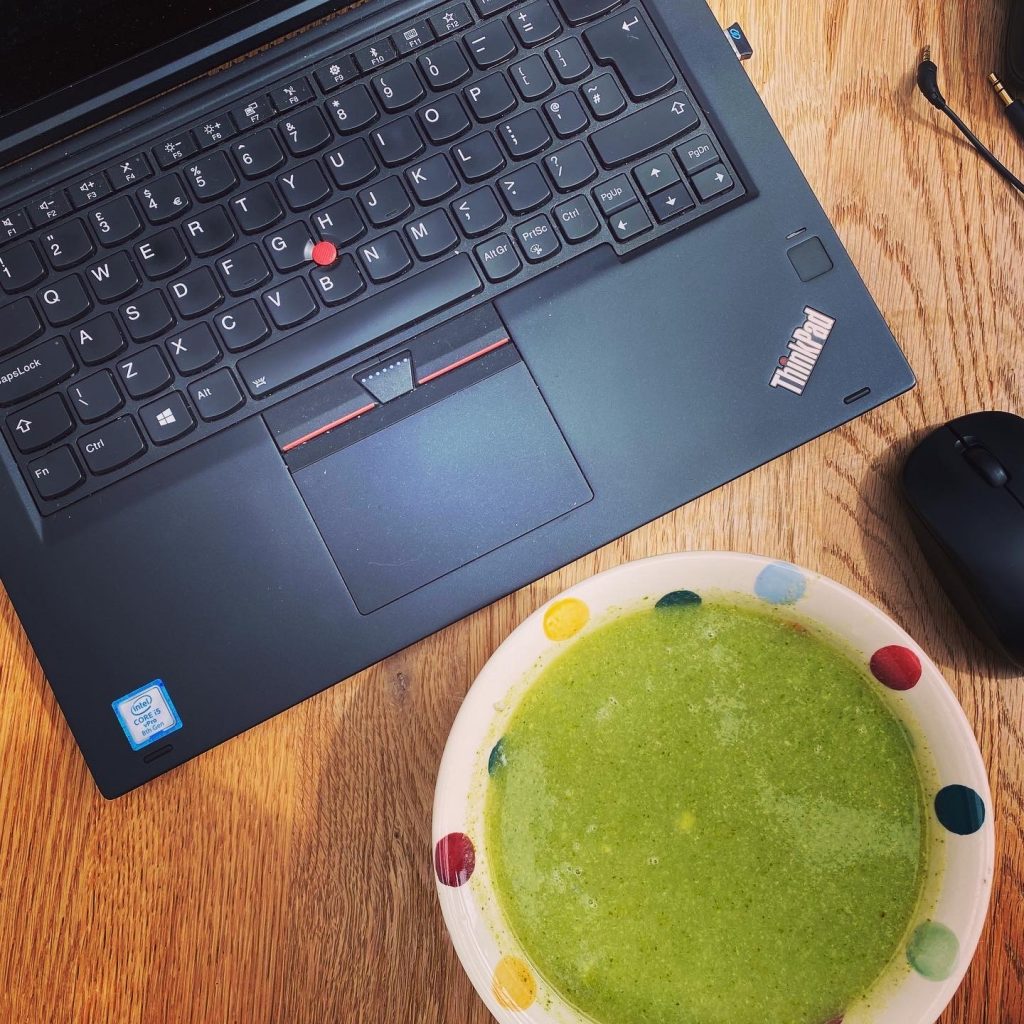 Broccoli soup and laptop