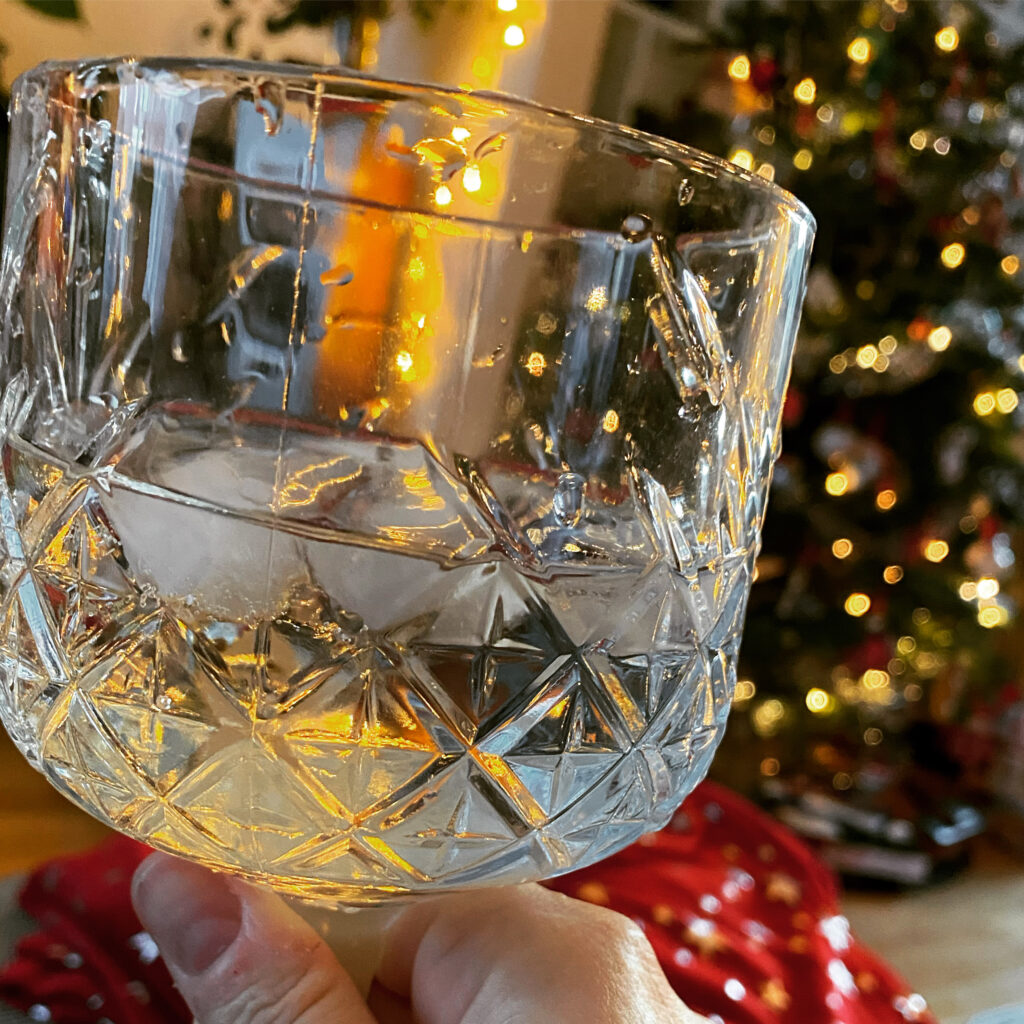 Gin and tonic by Christmas tree
